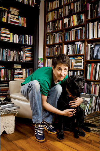 Rachel Maddow + dog + books