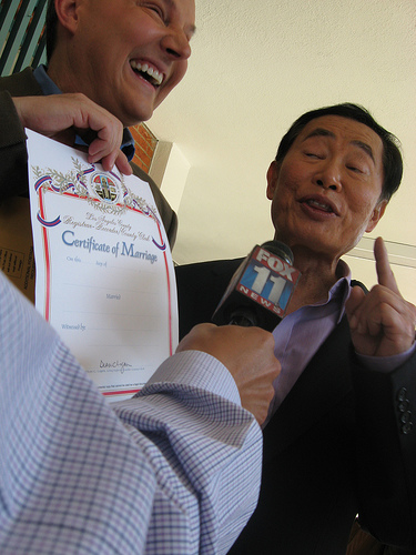 George Takei and Brad Altman with wedding certificate